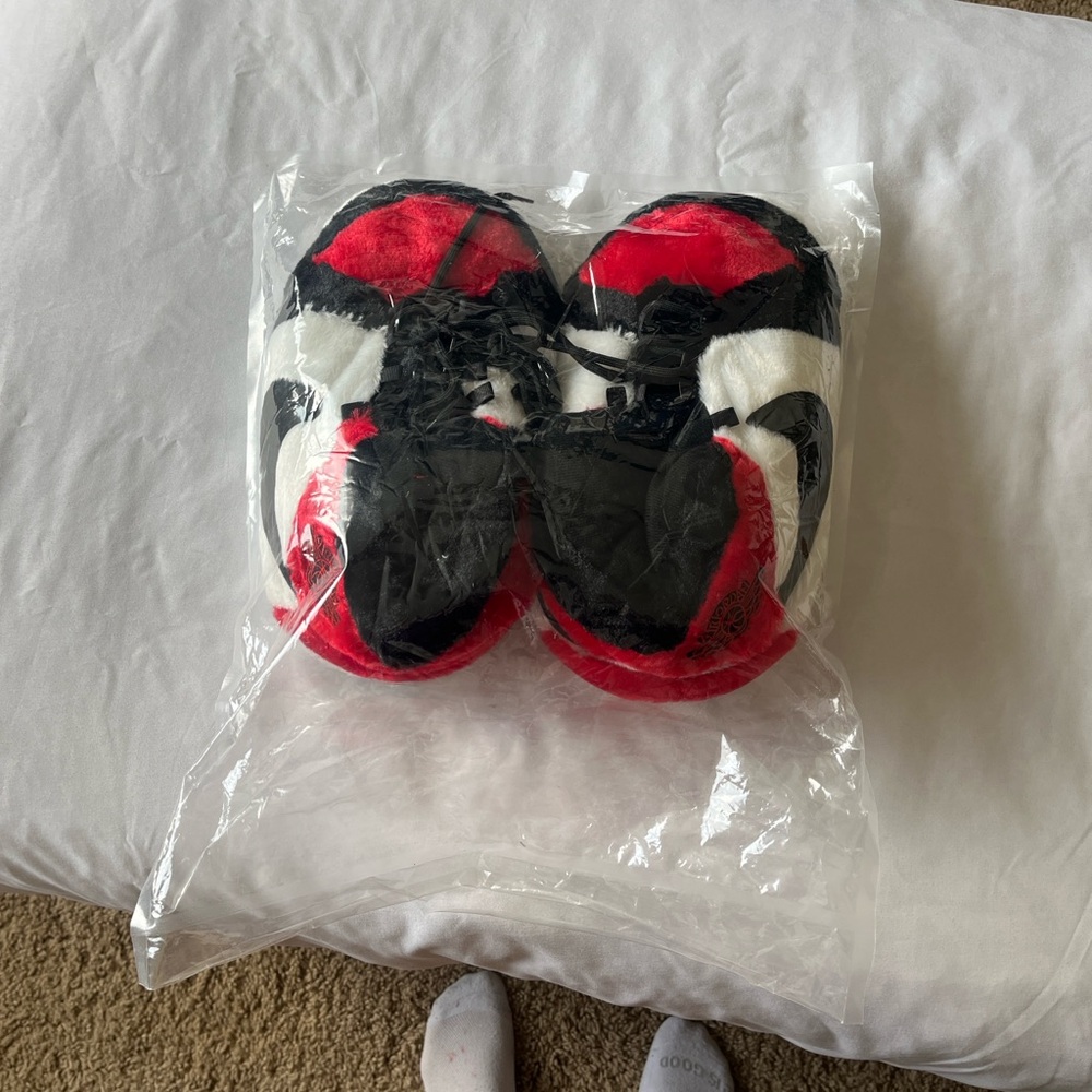 NWT Air Jordans Cozy plush slippers in red and black. Perfect for